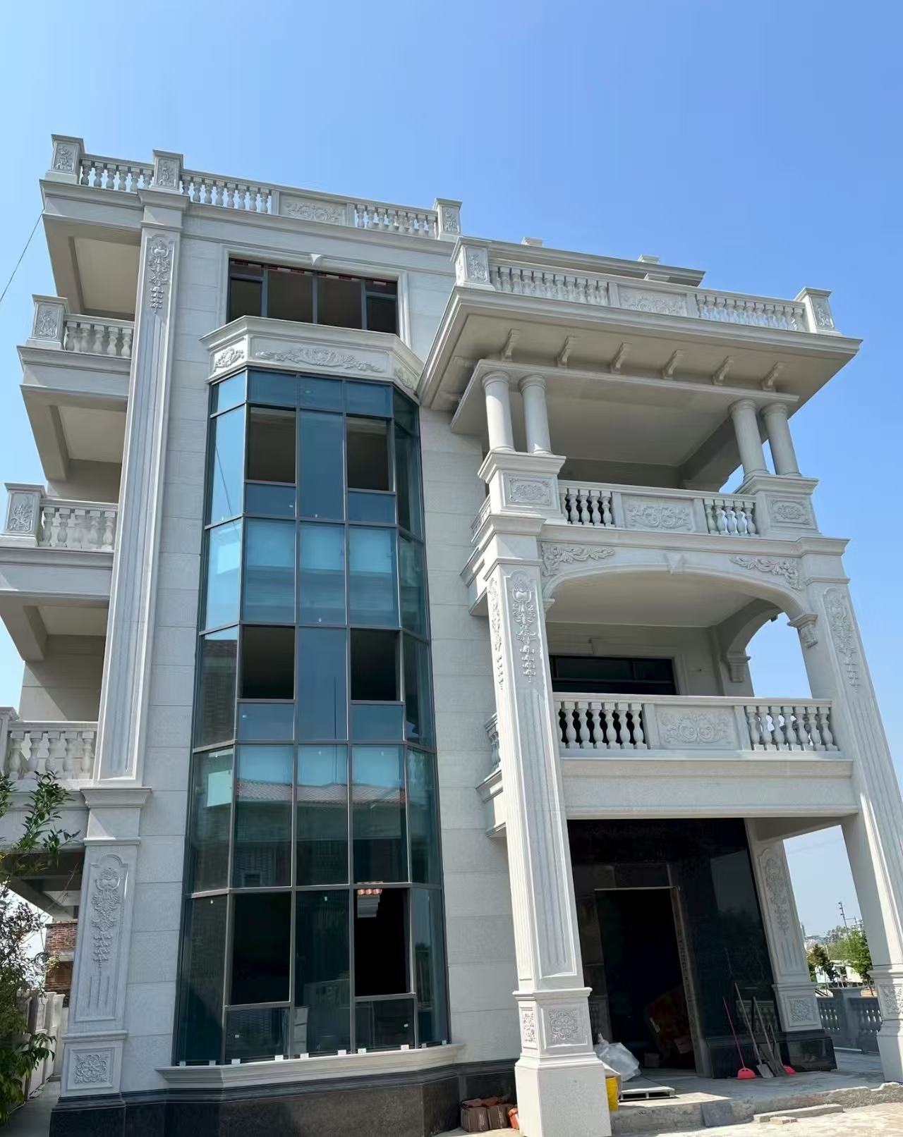 乌兰察布 芝麻白花岗岩别墅外墙干挂效果展示